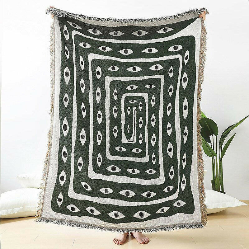 Eye pattern woven throw blanket.