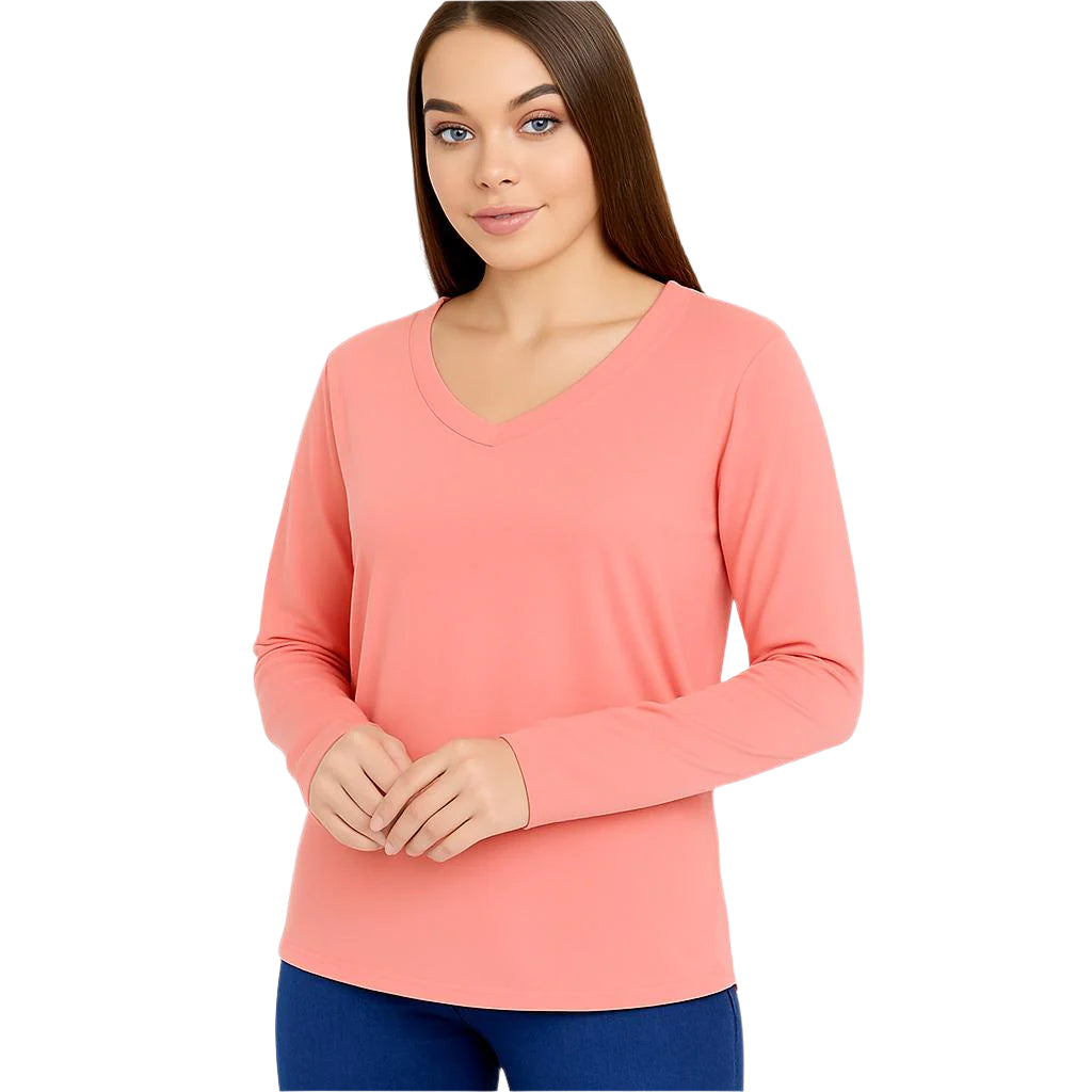 Woman wearing coral V-neck top.